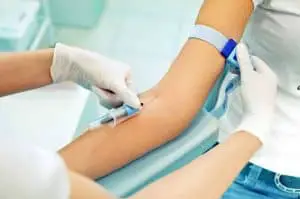Complications during blood collection (venipuncture) and treatment